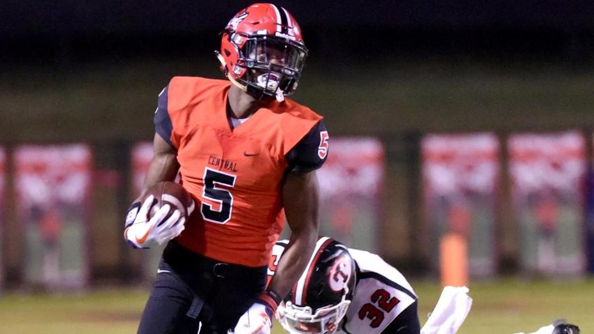 Central's Justyn Ross reverses field on Theodore's Demouy Kennedy for a 66-yard punt return in the 1st quarter of the game Friday night during the first round of the Class 7A playoffs on November 10, 2017