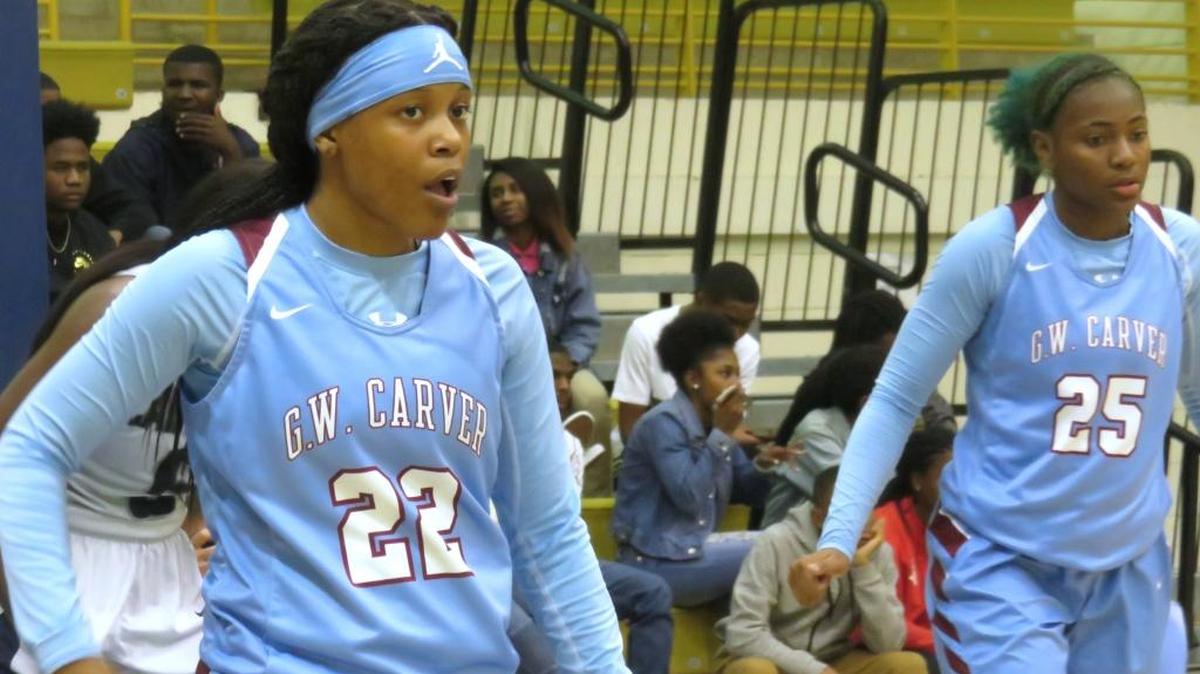 JaNya Love-Hill (22) and Jailyn Shaw (25) await an in-bound against Spalding in the Class 4A semifinals against Spalding