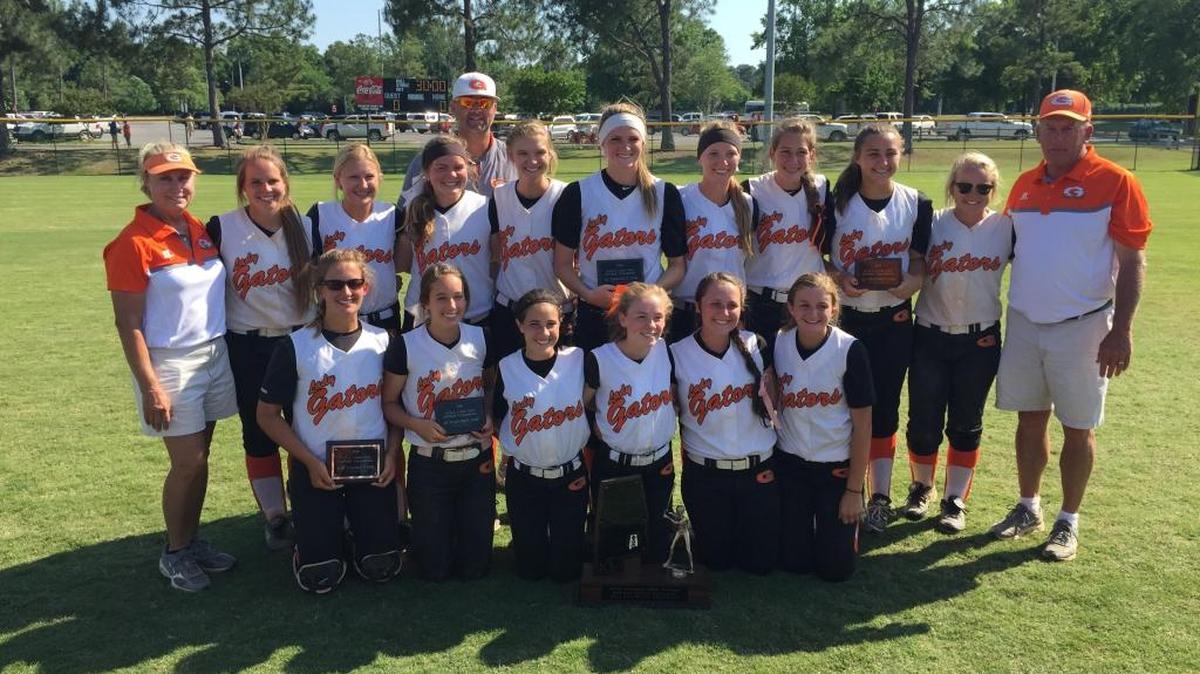 The Glenwood softball celebrates winning its second straight AISA state title on Saturday.