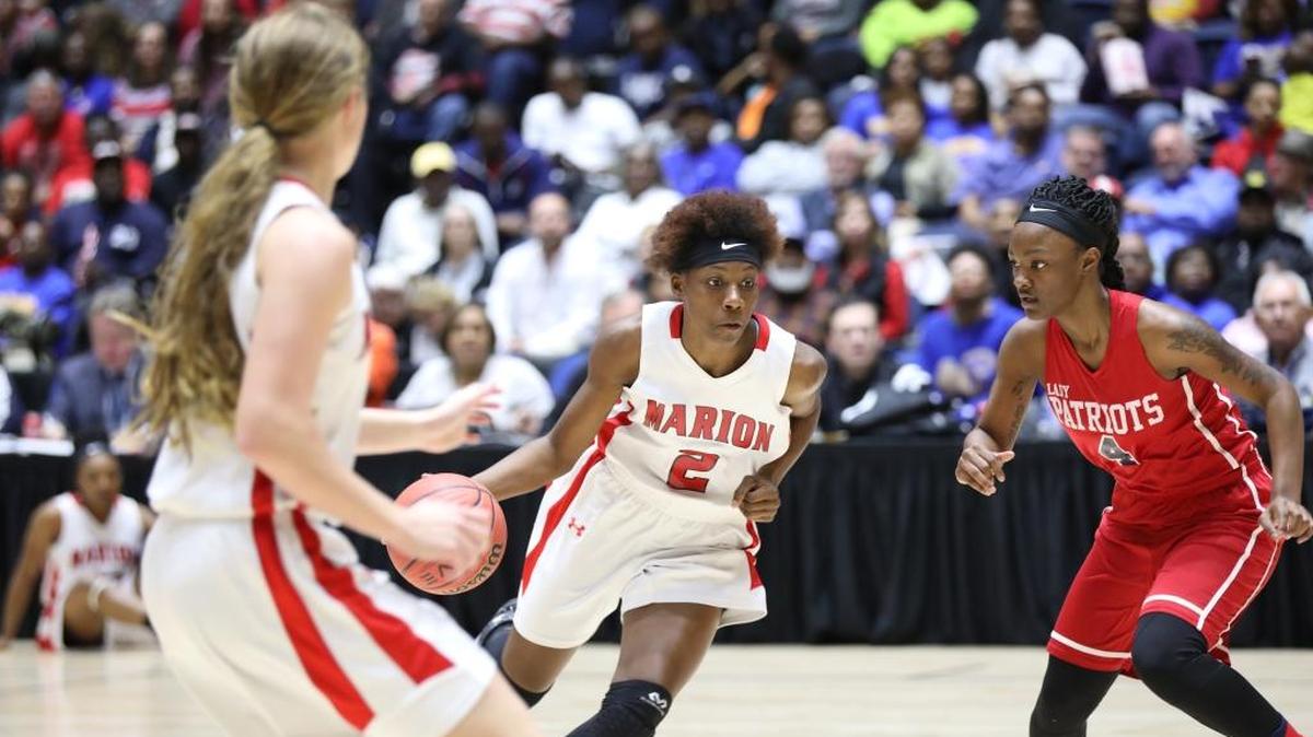 Marion County’s Torriunna Myers (2) drives to the basket in the Lady Eagles’ Class A-Public championship game matchup against Greenville on March 7, 2018