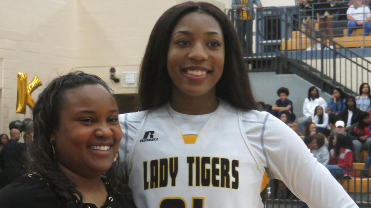 Harris County senior Jessika Carter poses with head coach Steffanie Ramsey after the Lady Tigers’ big win over Thomas County Central on January 12, 2018