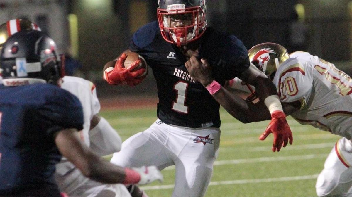 Northside High running back Fred Davis is hit by Hardaway High linebacker Tyrall Rosser in prep play at Kinnett Stadium Thursday, October 12, 2017.