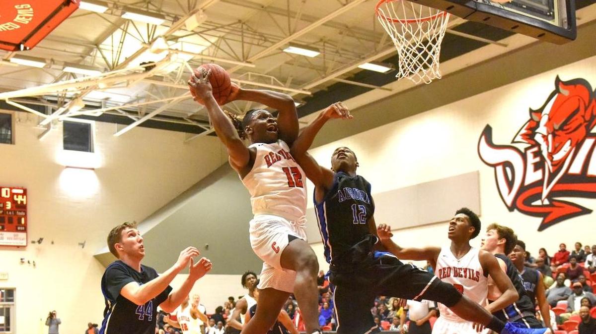 Central's DeAnthony Miles drives to the basket against Auburn's Preston Cook in the first period of the game against Auburn Friday night, January 26, 2018