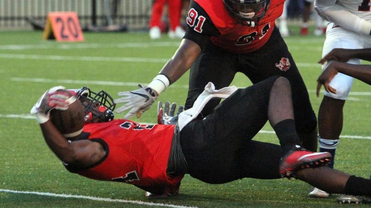 Central running back A'montae Spivey falls into the end zone for a touchdown against Bob Jones on August 25, 2017