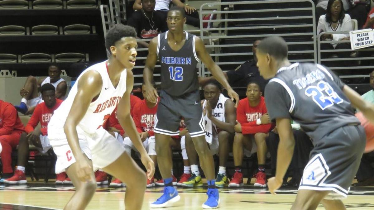Central’s Donald Jackson (3) steadies himself on defense against Auburn’s Chad Morgan (23) in the second quarter of the AHSAA Class 7A Central Regional championship. Jackson’s performance helped the Red Devils advance to the Class 7A quarterfinals in Birmingham