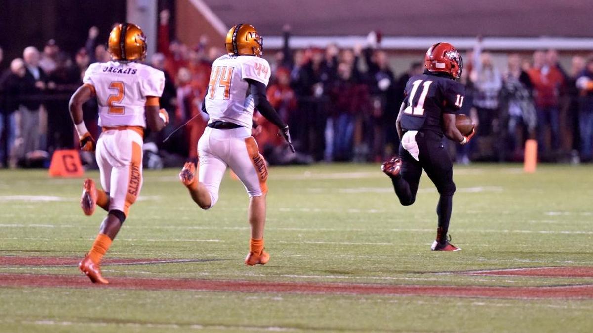 Central's Jamaar Spivey races through the McGill-Toolen defense for a 75-yard run in the fourth quarter Friday night, November 24, 2017 at Garrett-Harrison Stadium.