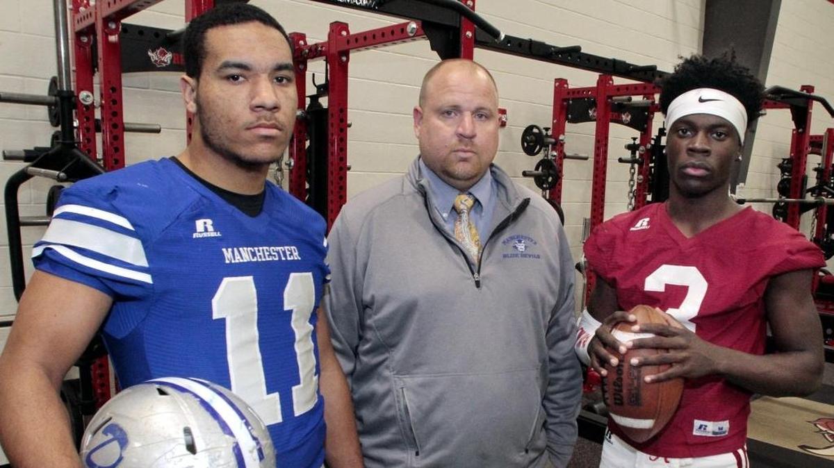 All Bi-City 1A-3A Defensive Player of the Year Jontavious Ferguson from Manchester, Coach of the Year Evan Hochstetler from Manchester, and Offensive Player of the Year Emmanuel Mann from Jordan