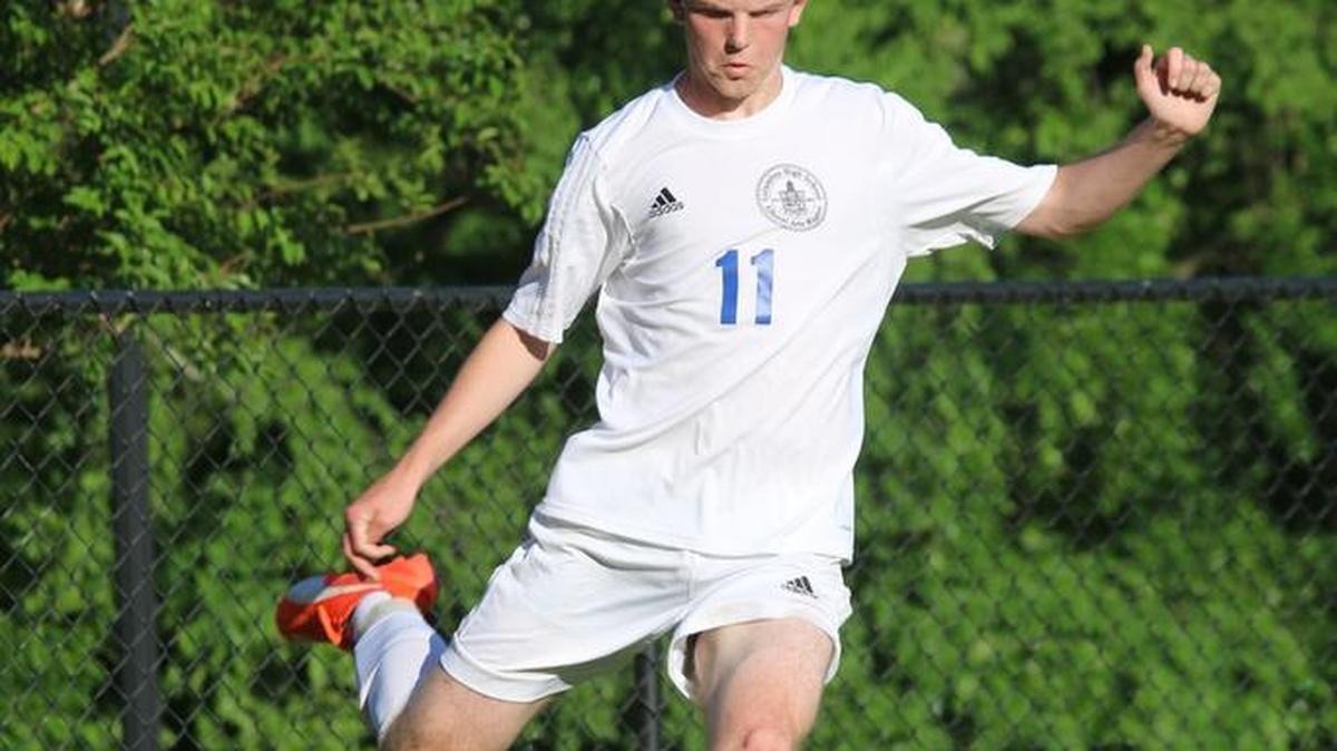 Columbus’ Noah Packard sends the ball in on a corner kick during the first half of the team’s 2-0 loss to Starr’s Mill on Tuesday in the first round of the Class 5A playoffs.