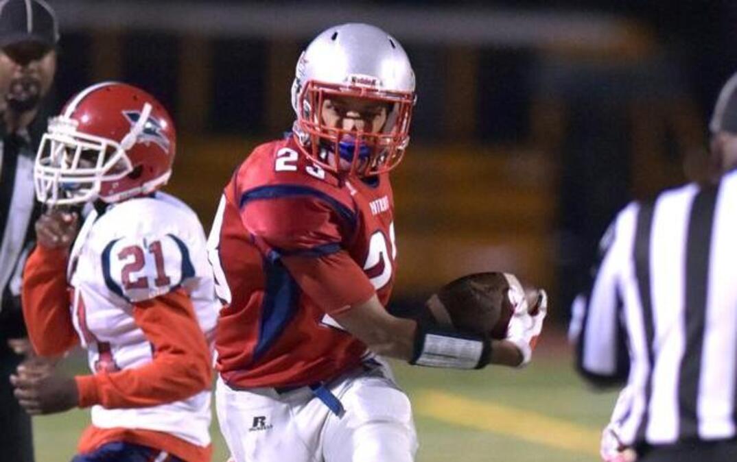 Northside’s Cordale Scott stays inbounds with a pass reception in the first quarter of the game against Westover Friday night.