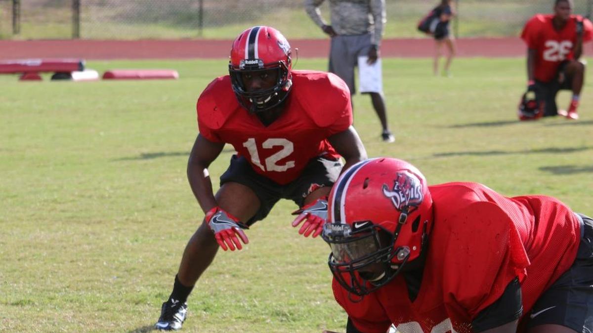Central linebacker Jarious Upshaw lines up during practice on Wednesday. He has stepped up into a leadership role for the Red Devils defense this season.