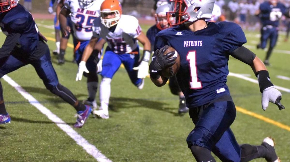 Northside’s David Apiag scores a touchdown against Columbus in the first quarter on Sept. 30.