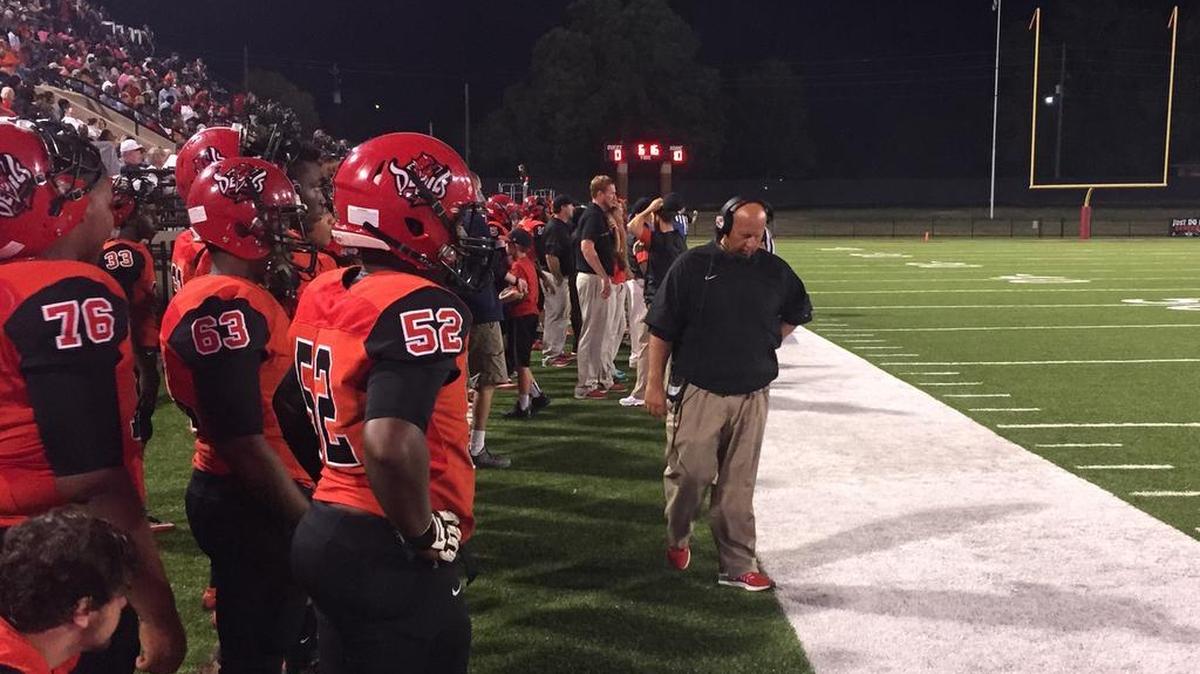 Central coach Jamey Dubose walks the sideline Friday, Oct. 14, 2016 during his team's game against R.E. Lee.