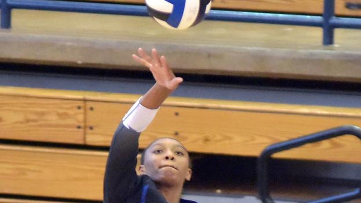 Columbus’ Tatyana Wyatt spikes the ball against LaFayette during the first round of Class 4A state playoffs Thursday night.
