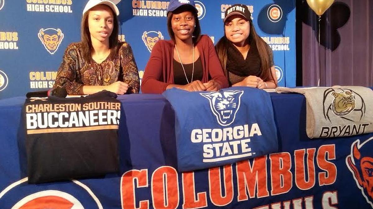 Columbus High volleyball players, from left, Skylar Blackmon, Jha’Meisheia Griffin and Alisi Motu’apuaka will play in college.