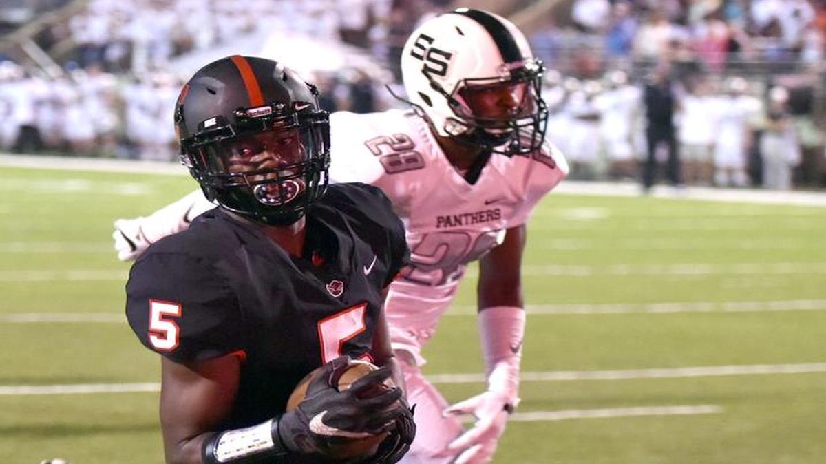 Central’s Justyn Ross brings in a touchdown reception Friday, September 22 against Smiths Station. Central won 62-7.