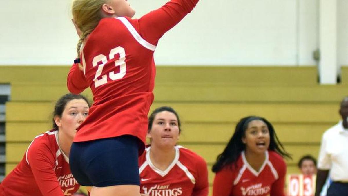 Pacelli’s Meg Torbert hits the ball over the net for a point against Baker County High School during Wednesday’s Area 1-A tournament.