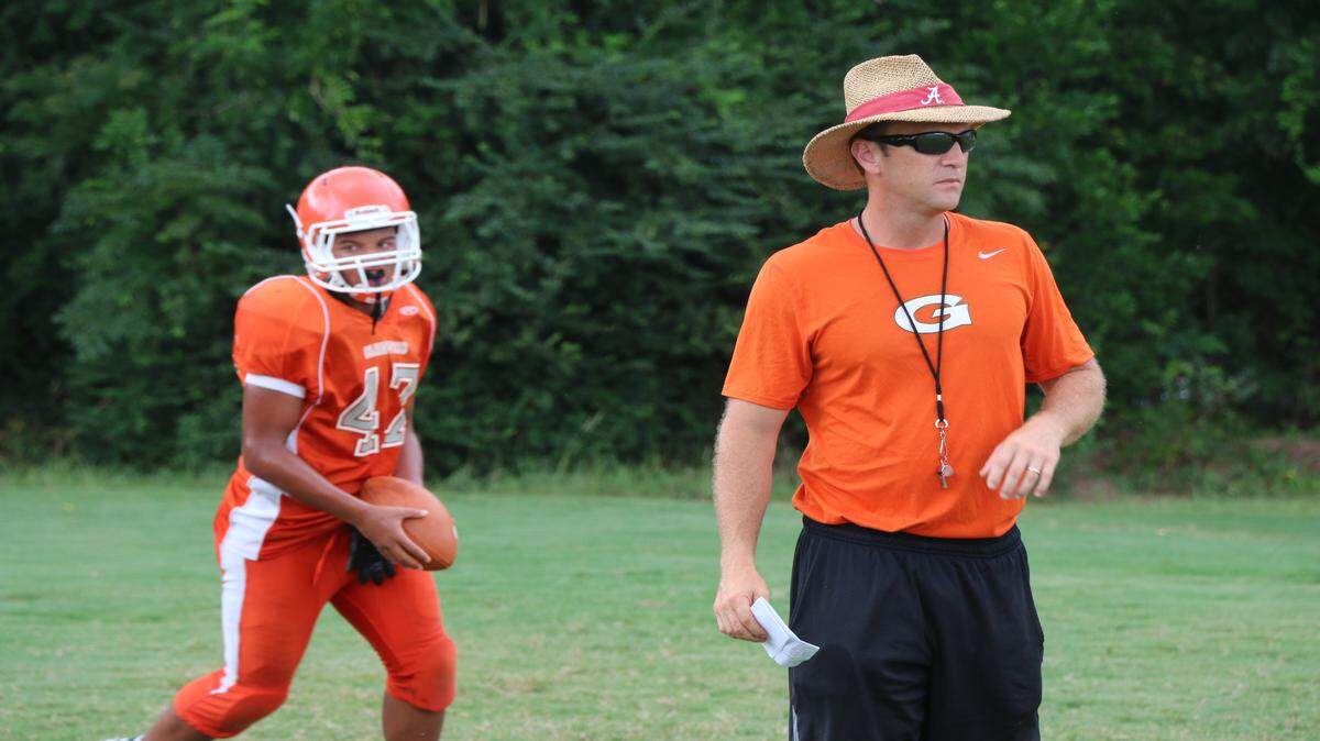 Coach Tripp Henderson oversees a drill during practice on Tuesday at Glenwood.