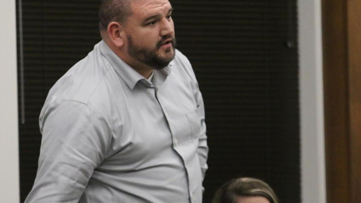 Smiths Station coach Adam Fossett is approved at a Lee County board meeting in February.