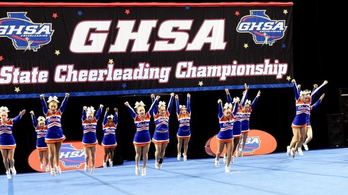 Columbus High School cheerleading team starts its routine for the Saturday morning session of the GHSA State Cheerleading competition on Saturday.