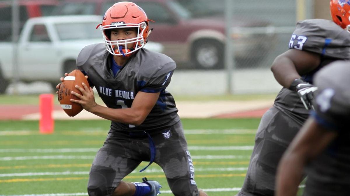 Columbus High quarterback Donovan Carter looks to throw against Jordan High during the Muscogee County School District Fall Classic at Kinnett Stadium Saturday. The Blue Devils beat the Red Jackets 47-32.