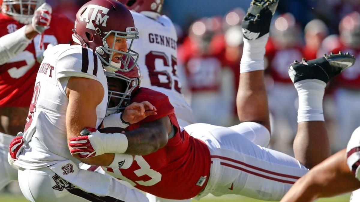 FILE - In this Oct. 22, 2016, file photo, Alabama defensive lineman Jonathan Allen (93) sacks Texas A&M quarterback Trevor Knight during the first half of an NCAA college football game,in Tuscaloosa, Ala.