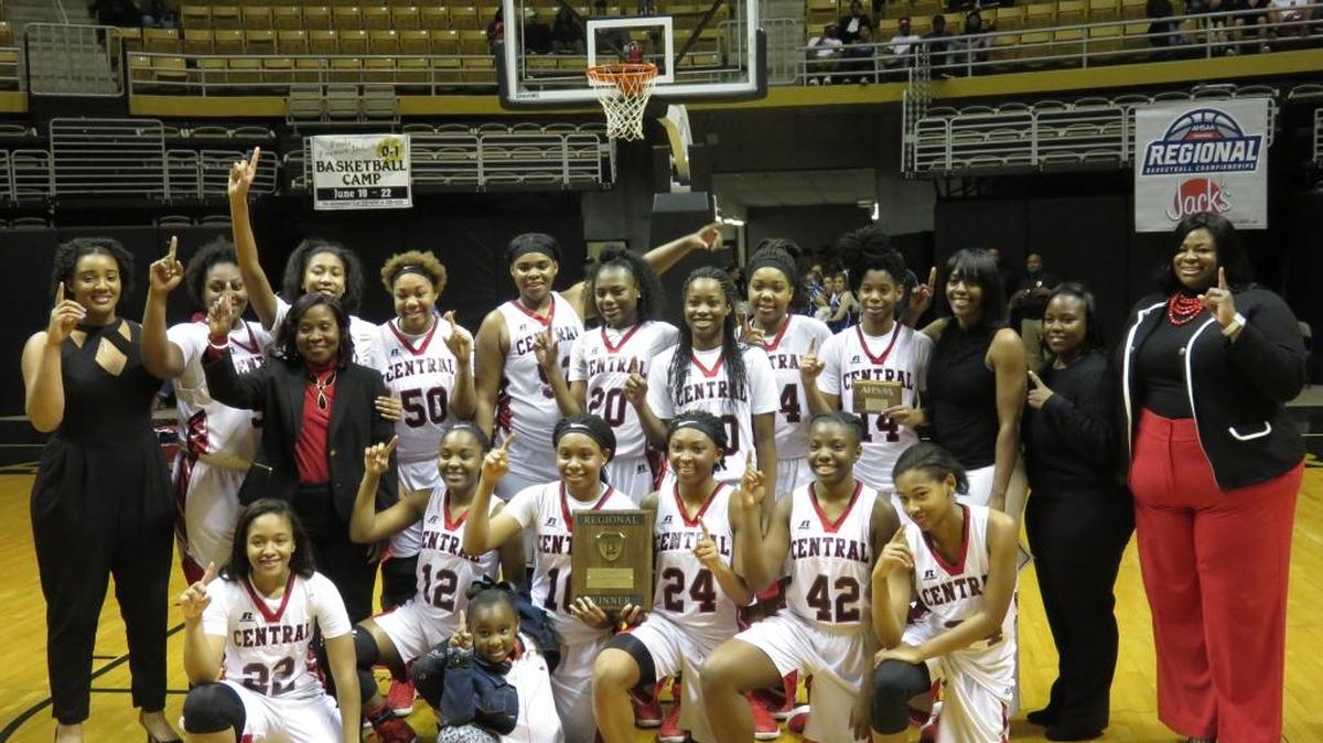 The Central Lady Red Devils celebrate after beating Auburn in Alabama State’s Acadome in Montgomery, Alabama, to advance to the Class 7A Final Four on Tuesday, February, 2017.