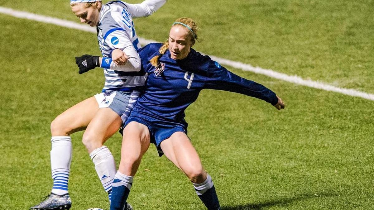 FILE - Columbus State's Tehgan Anguilm, right, and Grand Valley State player Tracey McCoy fight for control of the ball during the 2016 NCAA Division II women's soccer semifinals in Kansas City.