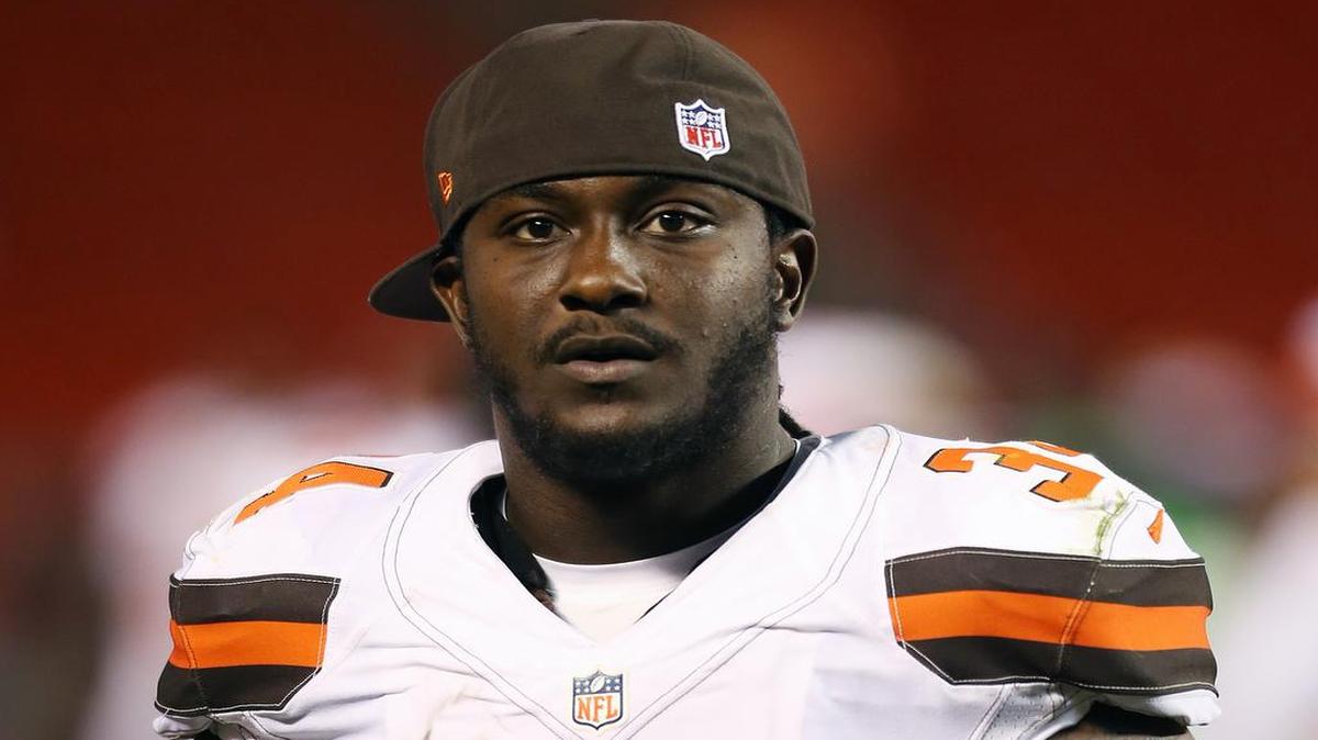 In this Aug. 13, 2015, file photo, Cleveland Browns running back Isaiah Crowell is shown during an NFL preseason football game against the Washington Redskins in Cleveland. Crowell attended the weekend funeral of one of the five Dallas police officers slain in a recent attack by a gunman.