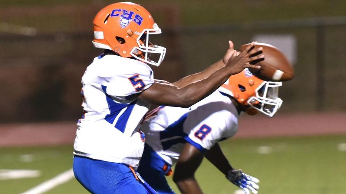 Columbus’ Caleb Bailey settles into the quarterback position late in the 2nd quarter of the game against Shaw on Thursday night at Kinnett Stadium, October 5, 2017