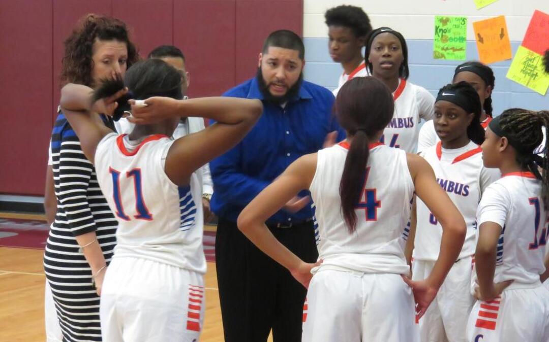 Columbus head coach Joe Cherrone talks with his team during Thursday’s region semifinal game