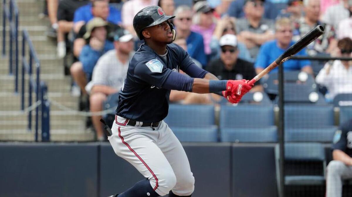 Atlanta’s Ronald Acuna watches after hitting a two-run home run against the New York Yankees in a March 2 spring training game in Tampa, Fla.