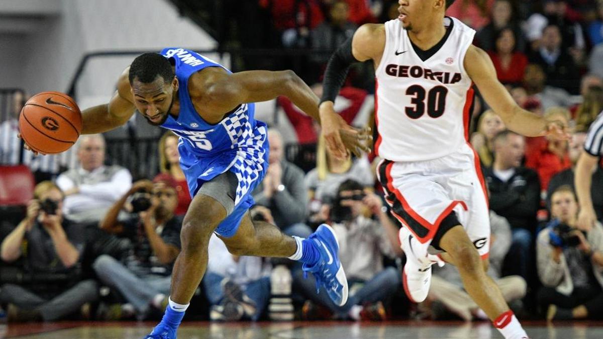 Kentucky guard Dominique Hawkins turns up the floor with a steal as Georgia guard J.J. Frazier defends during their game Feb. 18 in Athens, Ga. Kentucky won 82-77.