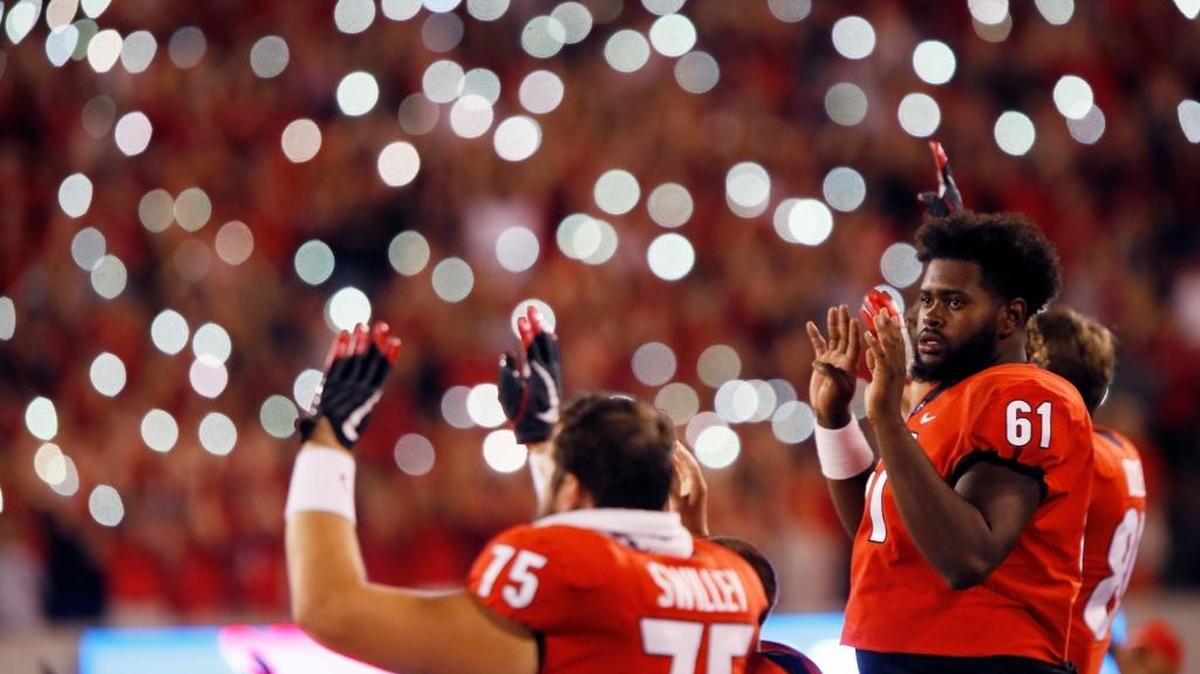 Georgia offensive lineman Chris Barnes (61) and teammates wait for the start of the fourth quarter against Missouri during an NCAA college football game Saturday, Oct. 14, 2017, in Athens, Ga.