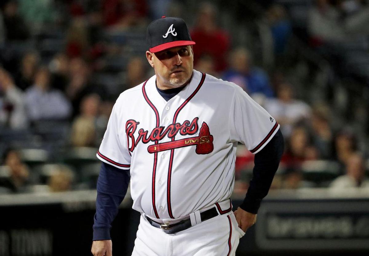 Atlanta Braves manager Fredi Gonzalez walks to the dugout in a baseball game against the Arizona Diamondbacks Friday, May 6, 2016, in Atlanta.