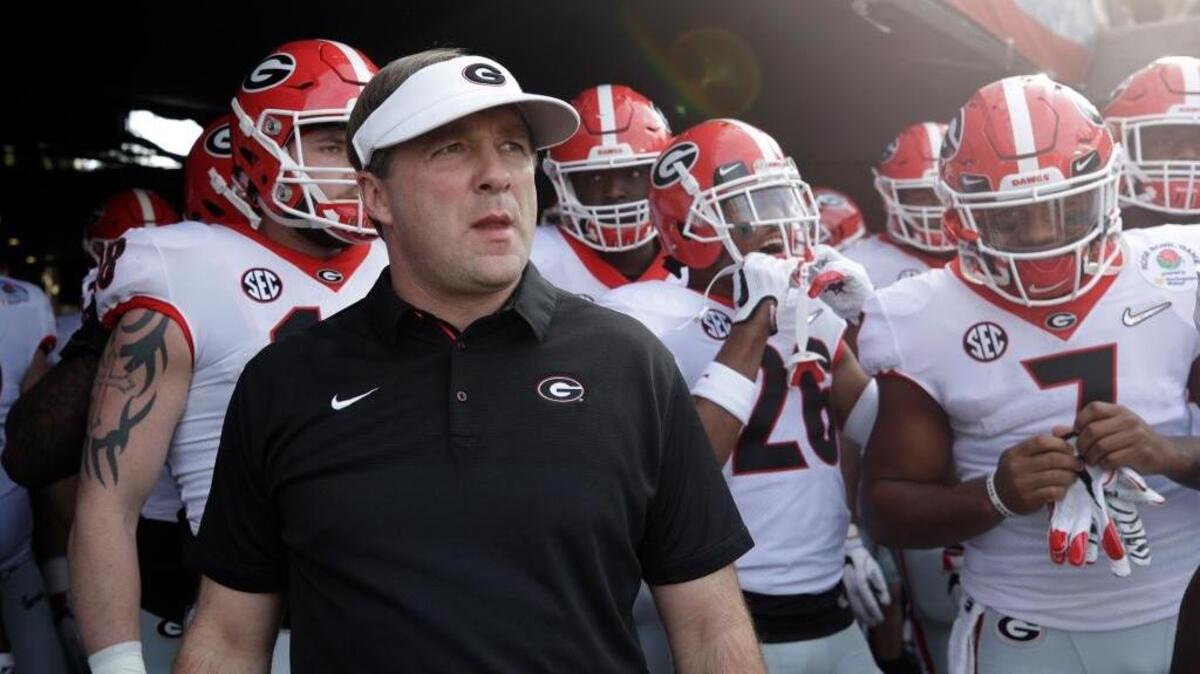 FILE - In this Jan. 1, 2018, file photo, Georgia head coach Kirby Smart waits with his team to run onto the field before the Rose Bowl NCAA college football game against Oklahoma in Pasadena, Calif.