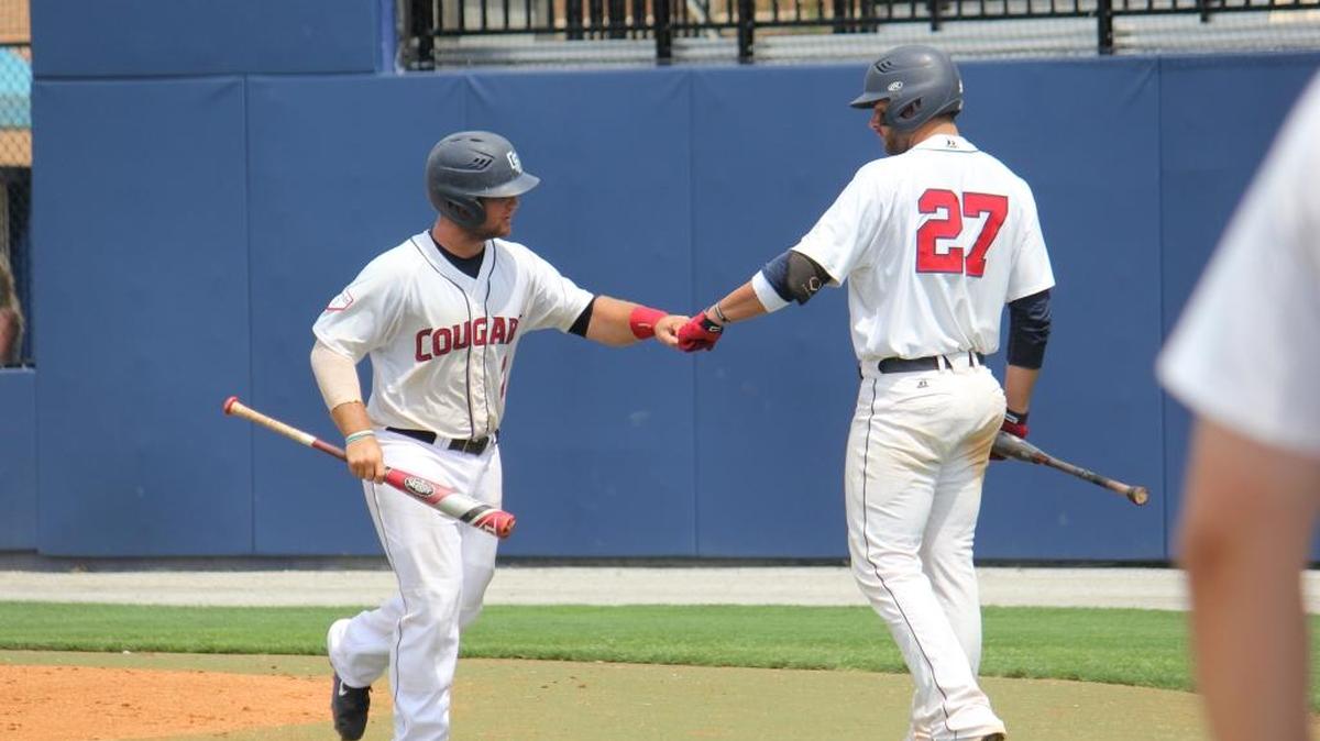 Columbus State’s Mike McClellan, right, congratulates Lake Hart after he scored Saturday.