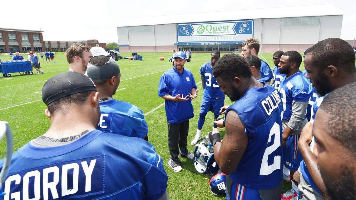 Carver grad, NFL coach Tim Walton brings lessons back to their origin