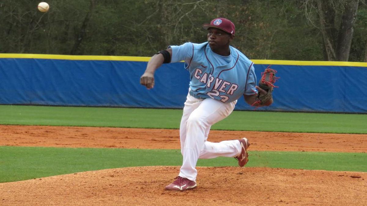 Carver’s Dajon Davis pitches in the first inning of the Tigers’ game against Brookstone on February 18, 2017.
