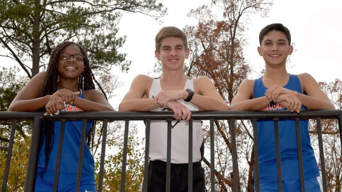 Columbus High School’s Heaven Allen is the 2017 All-Bi-City Girls Cross Country Runner of the Year. Allen is joined here by Smiths Station’s Silas Franklin and Columbus’ Alex Salgado
