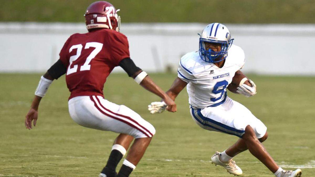 Manchester’s Kalil Brawner carries the ball against Jordan on Sept. 15, 2017 .